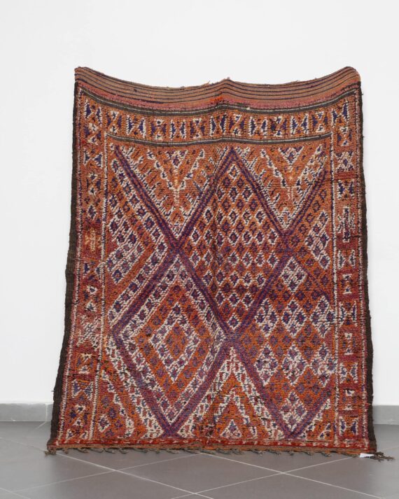 Vintage Zayan Rug 6.9x4.5 Ft handknotted in Morocco with Berber tribal motifs