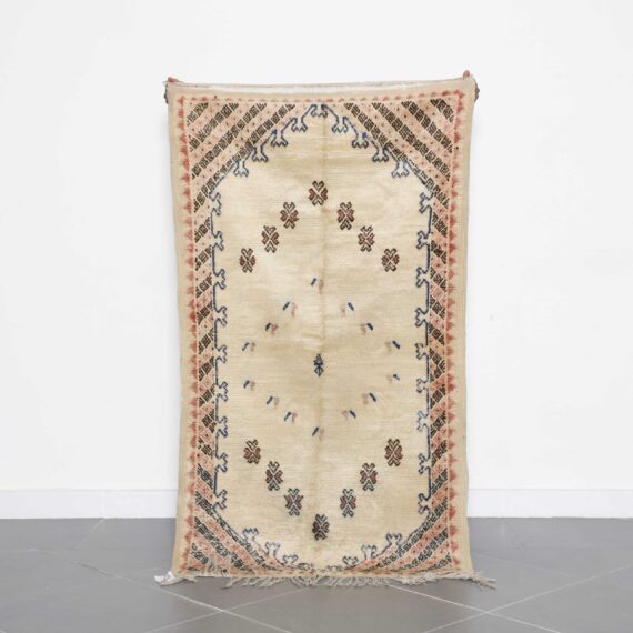 Taznakht Rug 5.4x3.0 Ft handcrafted in Morocco with faded cream color
