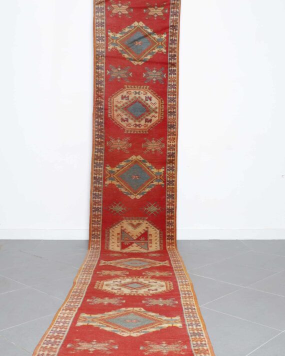 Handwoven Moroccan Taznakht runner 14.9x2.9 Ft with traditional Amazigh motifs and earth-tone design