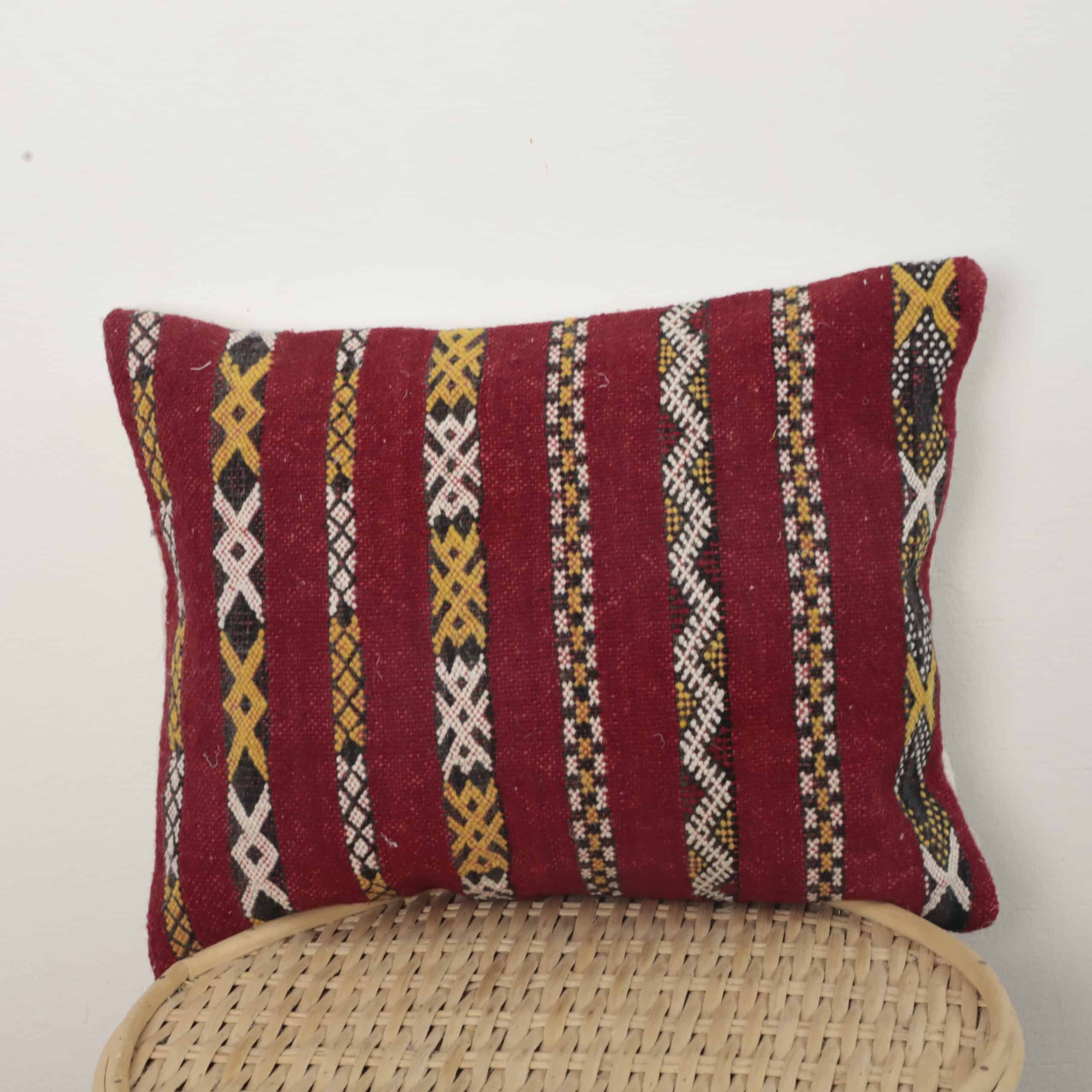 Moroccan tribal kilim pillow with red Berber geometric patterns