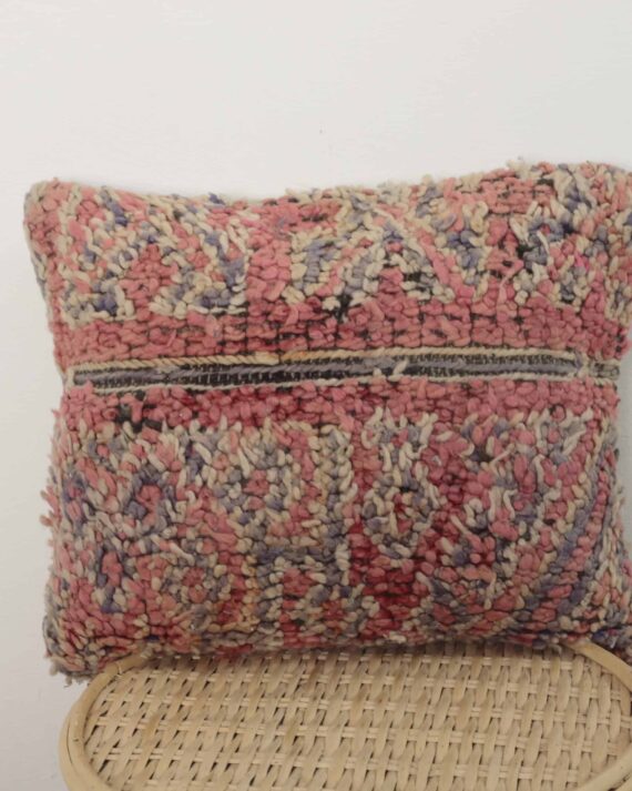 Moroccan soft wool pillow with handmade Berber texture and pastel tones