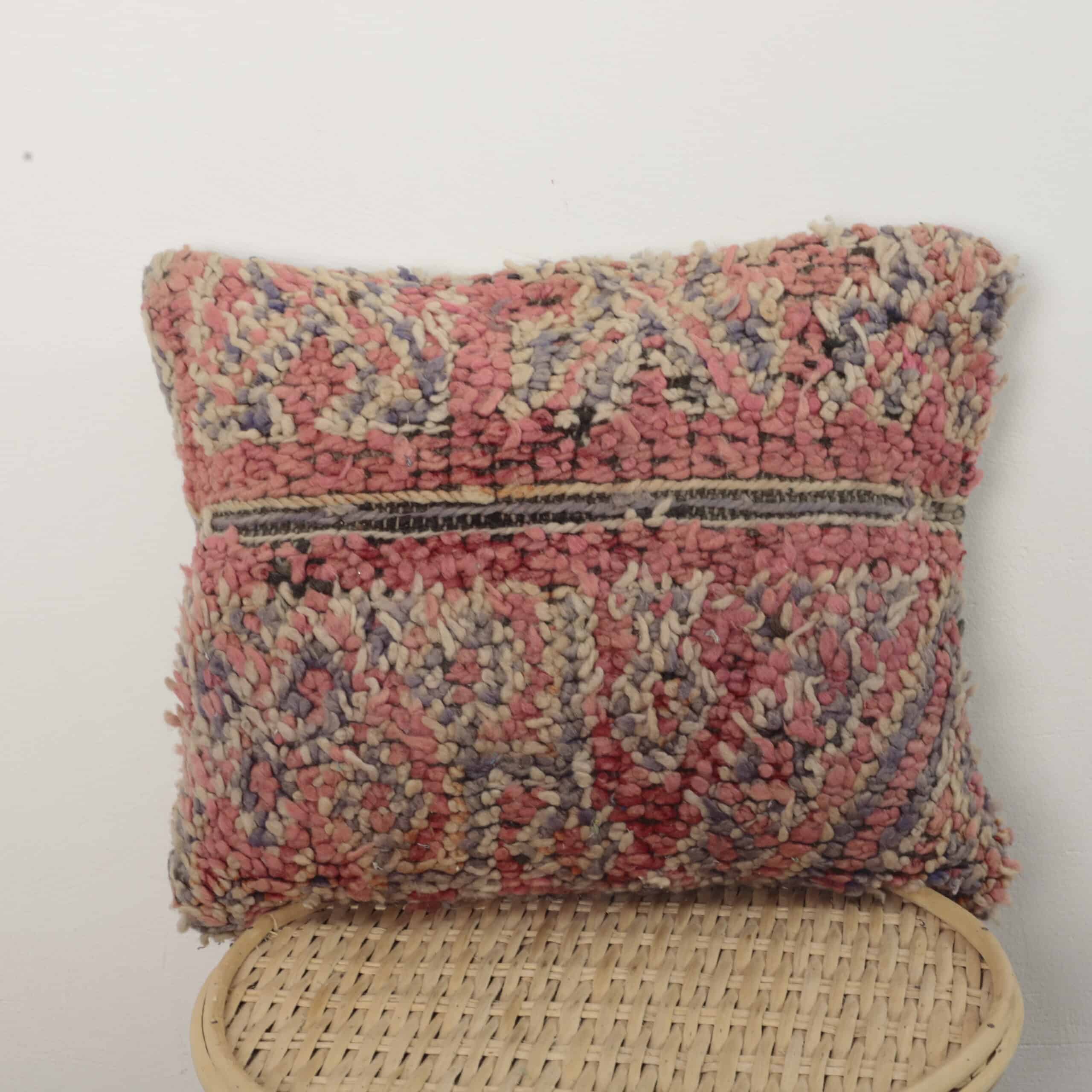 Moroccan soft wool pillow with handmade Berber texture and pastel tones
