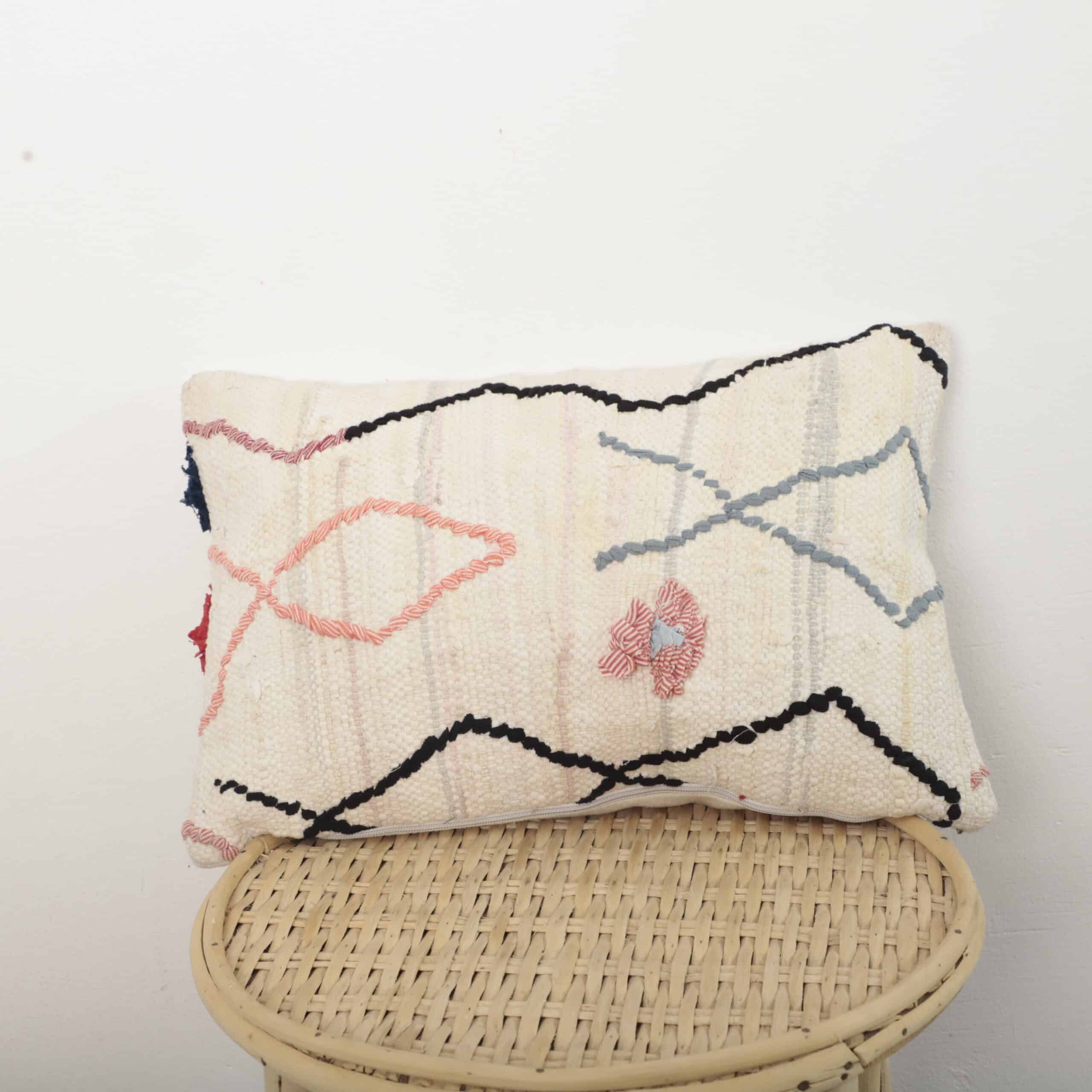 Moroccan Berber lumbar pillow in ivory wool with colorful geometric stitching, handmade decorative cushion 46x30 cm